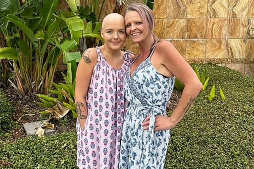 Maddy and her mother, Carissa Talmage, pose in front of a garden.