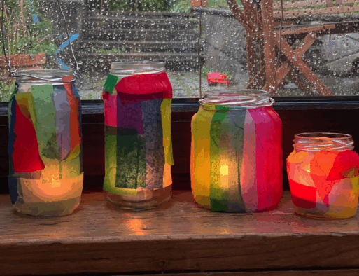 reuse of jars with colorful tissue paper applied with candles lit inside for a memorial service.