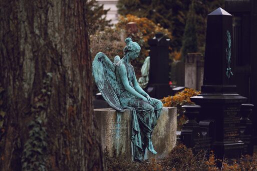 stone angel sculpture in a cemetery