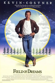 Kevin Costner stands in the forefront of the movie poster for Field of Dreams, against a backdrop of a baseball diamond and a row of corn stalks