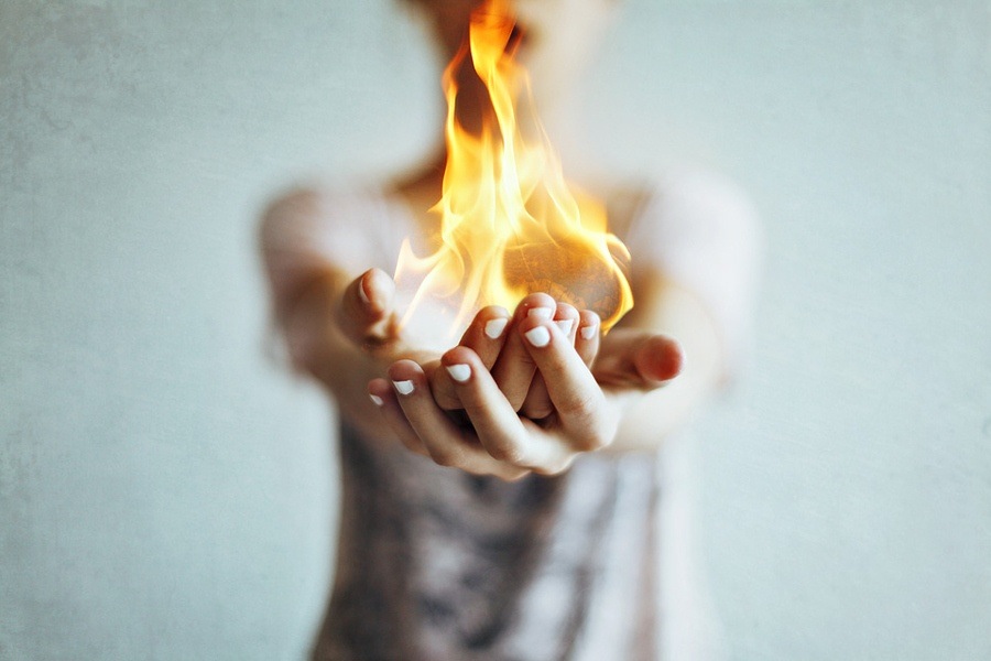 hand holding fire