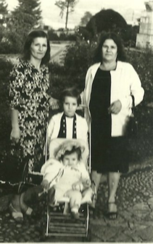 My grandmother, mother, older sister and me as a baby