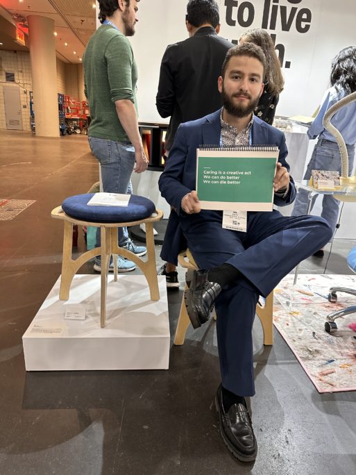 Ian poses with the stool her designed as a tribute to his mother 
