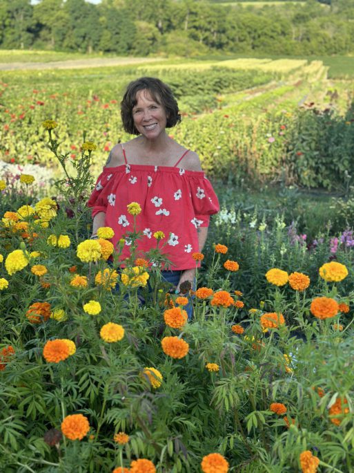Gabrielle Ramirez poses in a field of flowers.